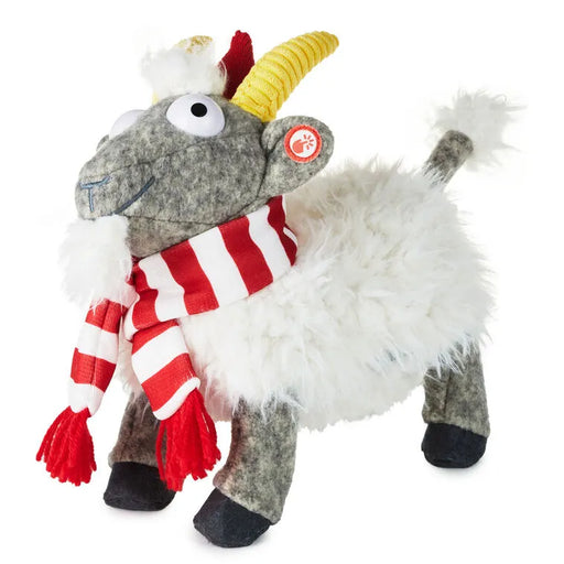 Plush toy goat with a red and white scarf on a white background. Plays sound and had motion. 
