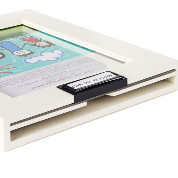 White frame with a display showing colorful kids drawing and text on a white background