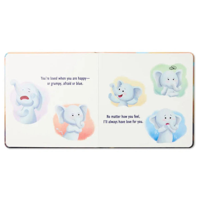 Children's book with cartoon elephants on a white background