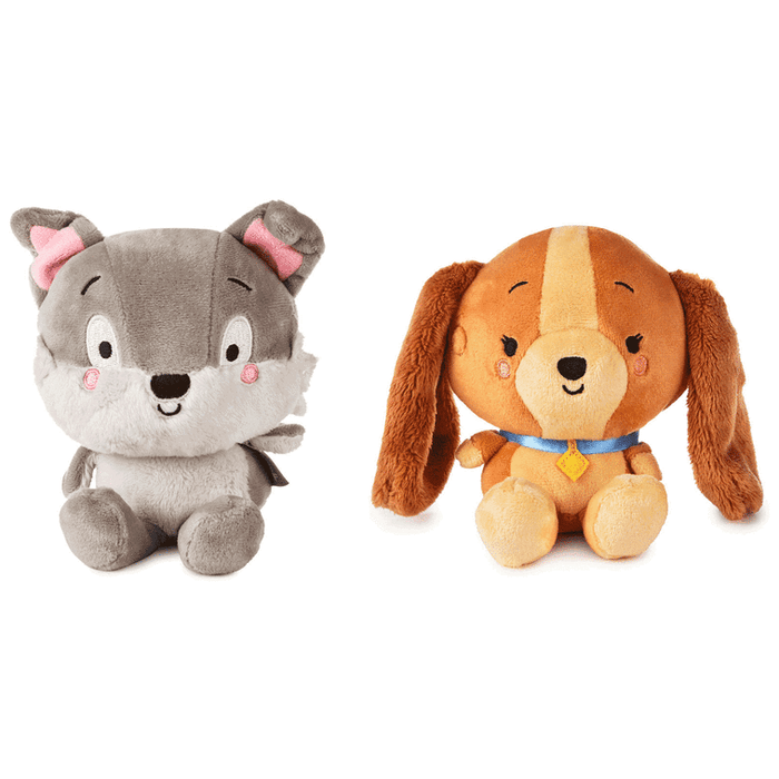 Two Better Together plush toy dogs , one gray and one brown, on a white background