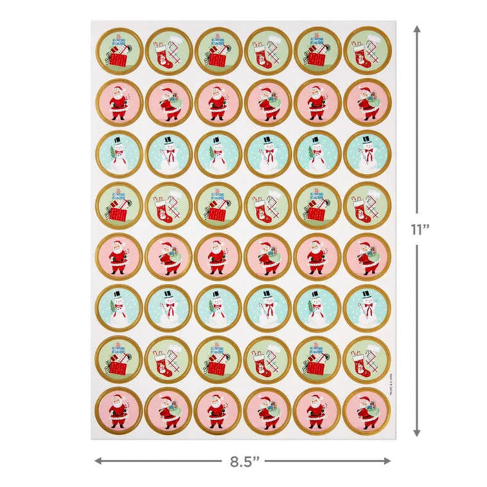 Sheet of Christmas-themed stickers with Santa Claus designs on a white background