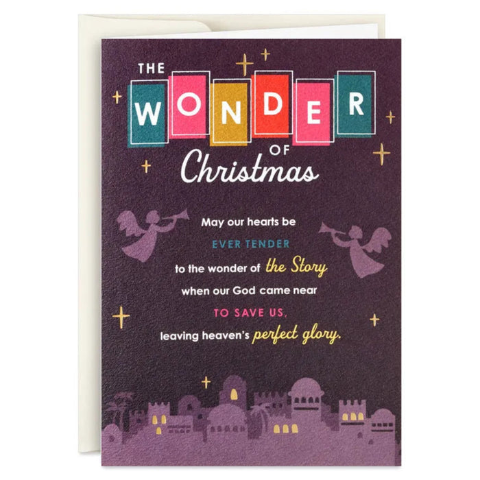 Christmas card with colorful text and angel illustrations on a purple background