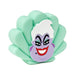 Shell-shaped character with a purple face and red lips on a white background