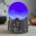 Decorative lamp with a purple glowing sphere and intricate Evil Queen design on a white background