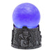 Decorative object with a purple glowing ball on a gray base featuring an engraved Evil Queen face on a white background. 