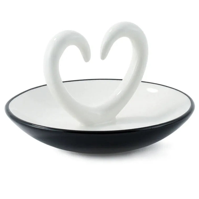 Side view Ring dish ceramic with arms that shape a heart. trinket dish on a white background. 