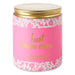 Pink candle jar with gold lid and 'best mom ever' text on a white background