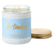 Candle in a jar labeled 'A+ Teacher' with a blue label and gold text on a white background.