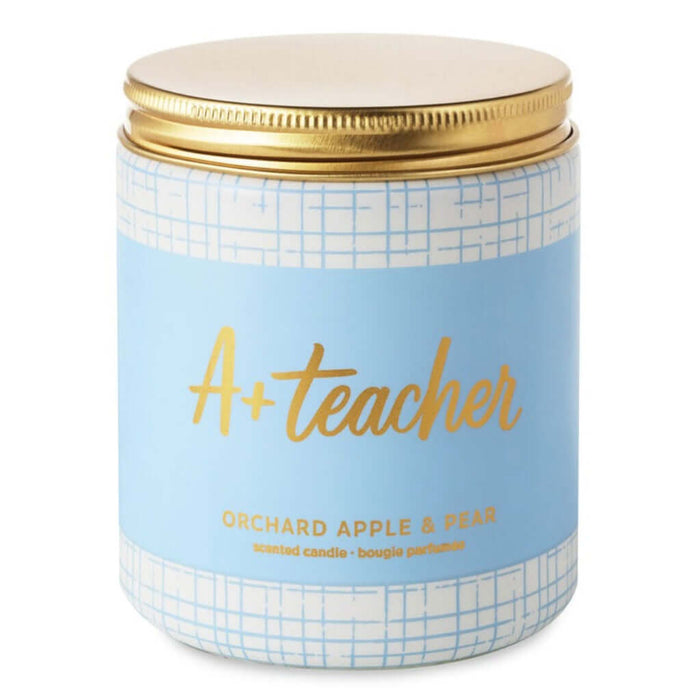 Candle jar with 'A+ Teacher' text on a light blue label with gold accents.