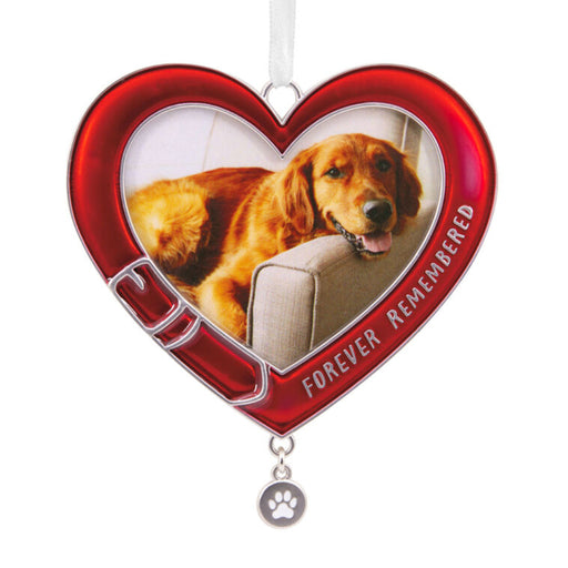 Heart-shaped red ornament with a photo of a dog and 'Forever Remembered' text on a white background