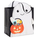 Halloween-themed gift bag with ghost design and pumpkin basket on a white background