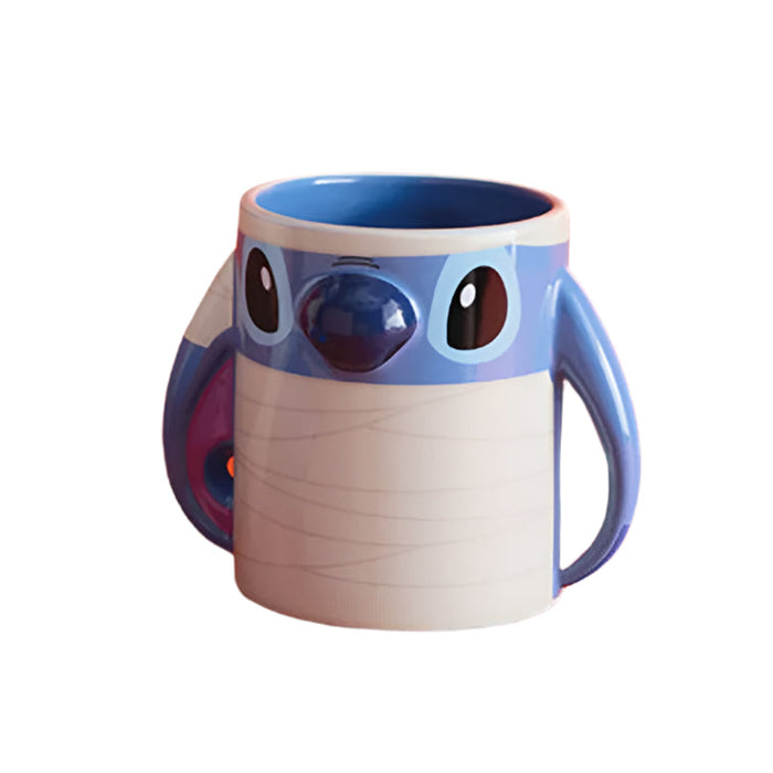 Blue and white mug shaped like a cartoon character Stitch on a white background