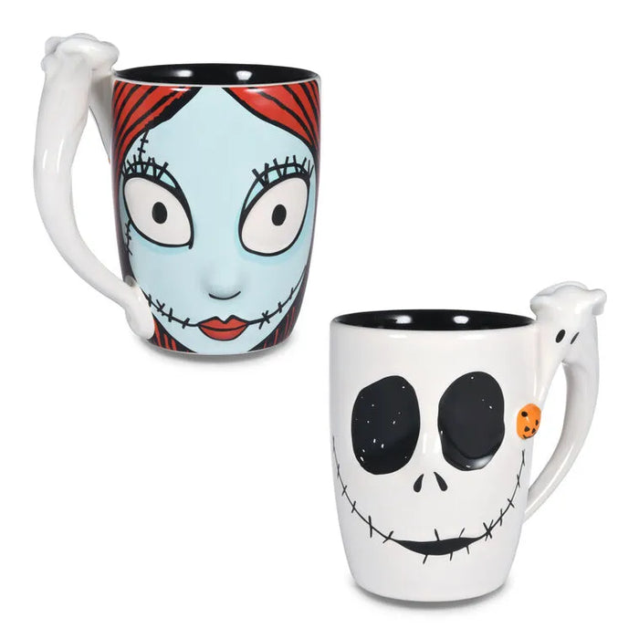 Two mugs , one with Sally's face and the other Jack's face from Tim Burton's The Nightmare Before Christmas on a white background