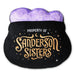 Black plushy pillow with lights and  'Property of Sanderson Sisters' text and purple top on a white background