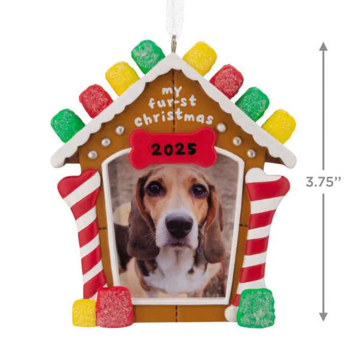 Decorative gingerbread house-shaped ornament with a dog photo and 'my furst Christmas 2025' text.