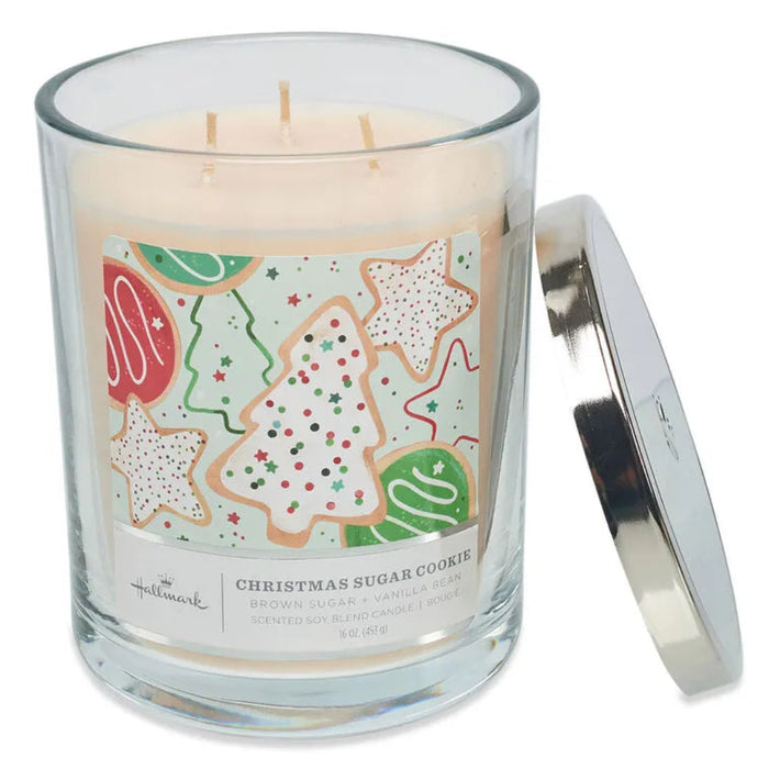 Hallmark 3 wick Candle with a Christmas-themed cookie label on a white background