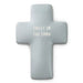 Gray cross-shaped object with 'Trust in the Lord' text on a white background