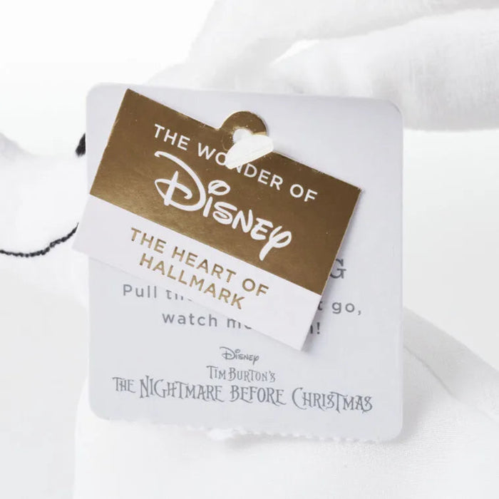 Tag from Disney and Hallmark with text and branding Disney Tim Burton's The Nightmare Before Christmas Zero Zip-Along Plush toy.