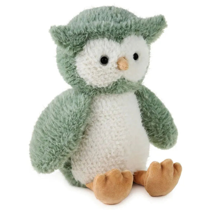 Plush owl toy with green feathers on a white background