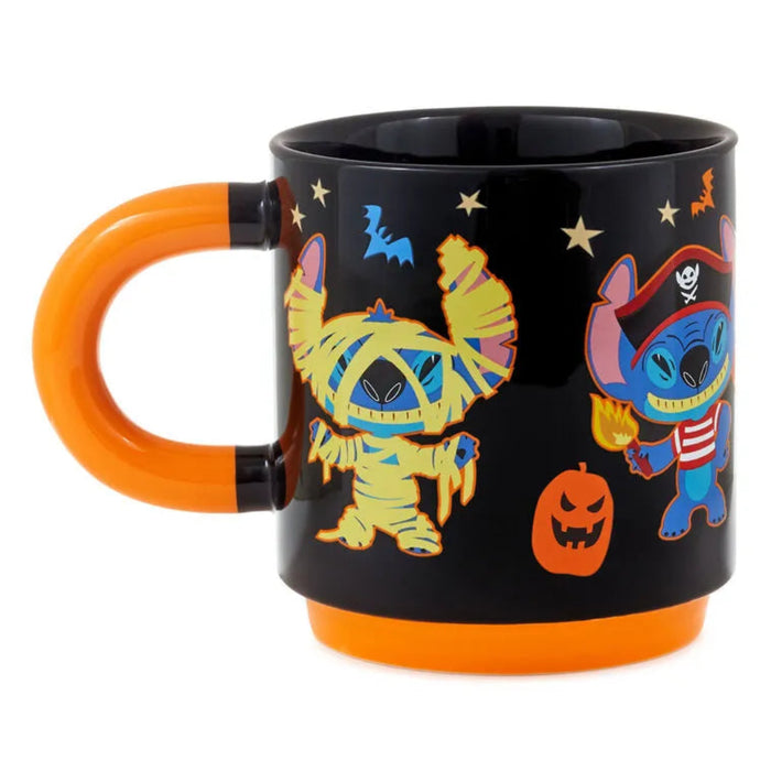 Black mug with Halloween-themed designs featuring cartoon characters Stitch on a white background