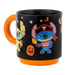 Black mug with orange handle and bottom, featuring cartoon character Stitch in pirate costume and Halloween-themed design.