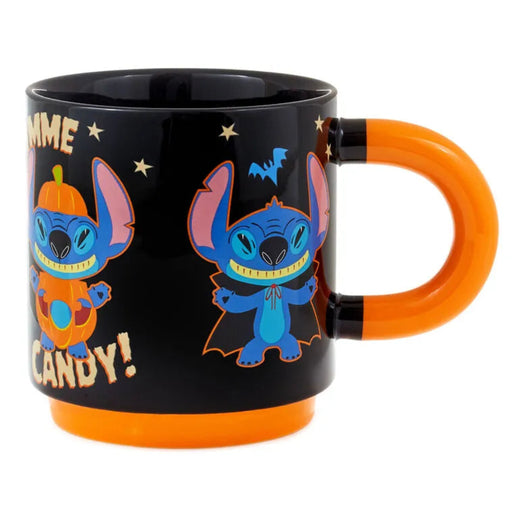 Black mug with orange handle featuring cartoon character Stitch  in Halloween costumes on a white background