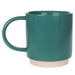 Teal mug with a ceramic  base on a white background