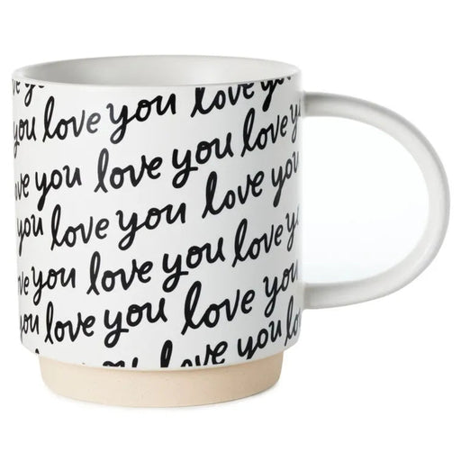 White mug with 'love you' text pattern on a white background