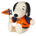 Plush toy dog in an orange and navy letterman jacket holding a 'RAH!' flag on a white background