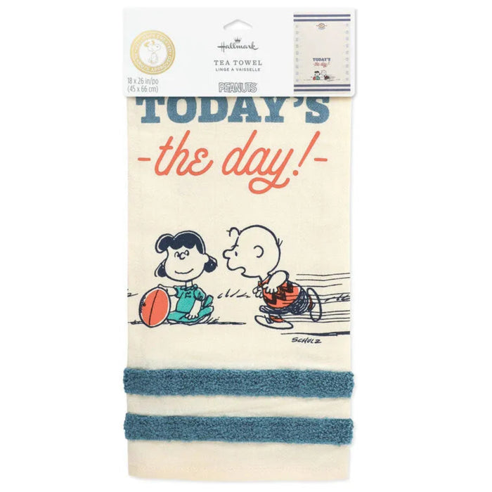 Tea towel with cartoon characters and 'Today's the day!' text on packaging