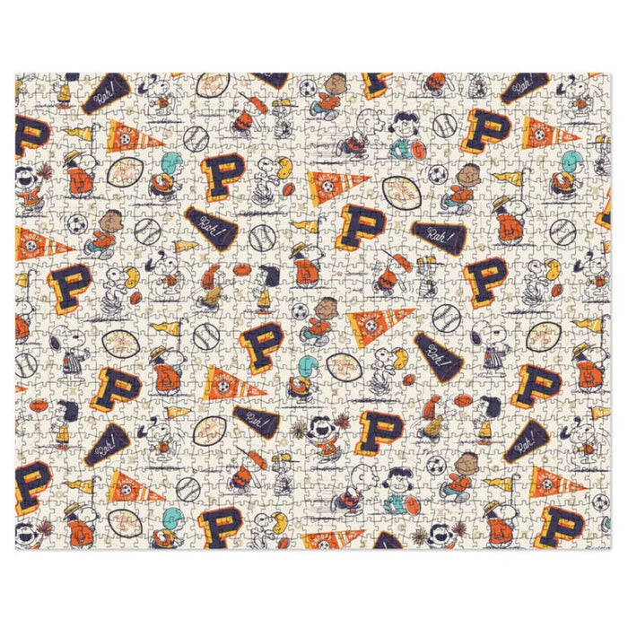 Patterned fabric with letters 'P', sports-themed designs, and cartoon characters on a white background.