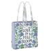 Tote bag with floral design and 'Love in Full Bloom' text on a white background