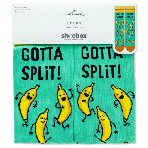 Packaging of socks with banana illustrations and 'Gotta Split!' text, featuring the Shoebox brand.