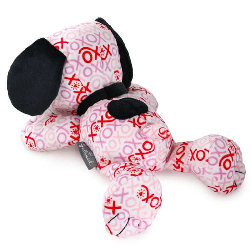 Pink and red patterned Snoopy  dog toy with black accents on a white background