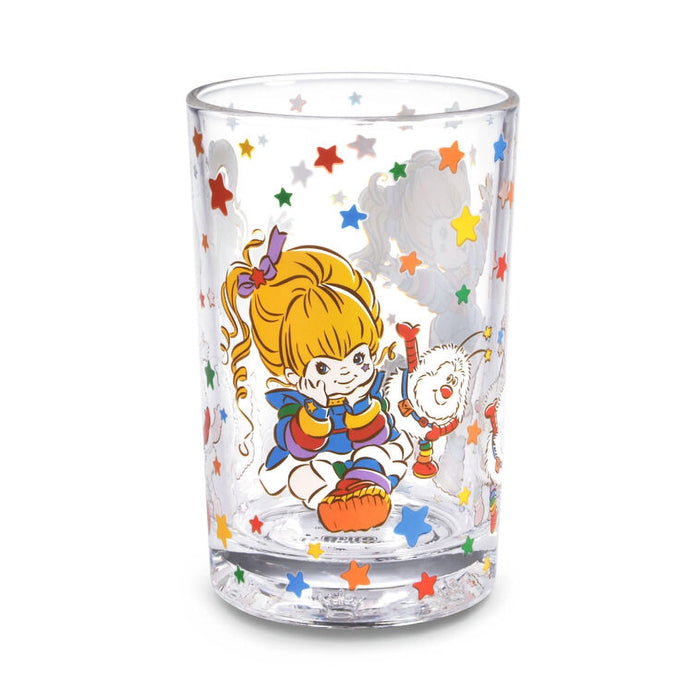 Clear glass with colorful cartoon character and star patterns on a white background