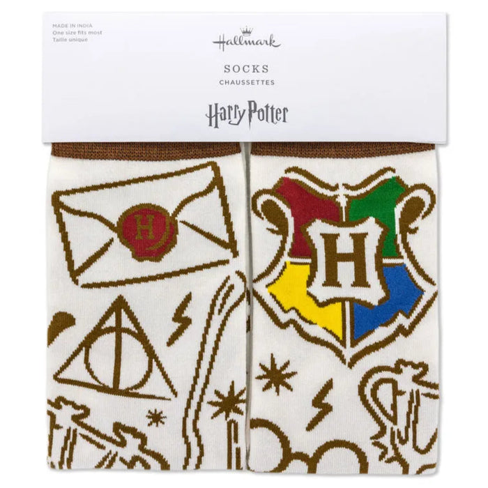 Pair of socks with Harry Potter-themed designs on a white background