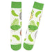 Pair of socks with green leaf  and Golden Girls patterns on a white background