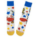 Colorful socks with cartoon characters and star patterns on a white background