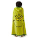 Person wearing a green grinch hooded blanket with a face design on a white background 