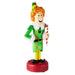 Christmas elf figurine nutcracker holding a candy cane on a white background