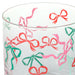 Clear glass with colorful bow pattern on a white background