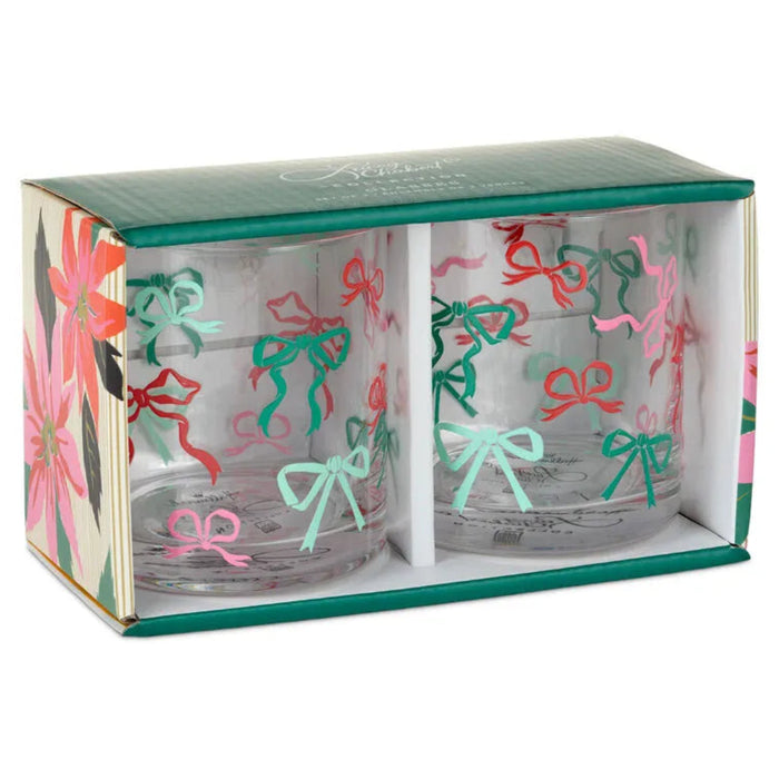 Set of two clear glasses with colorful bow designs in a decorative box.
