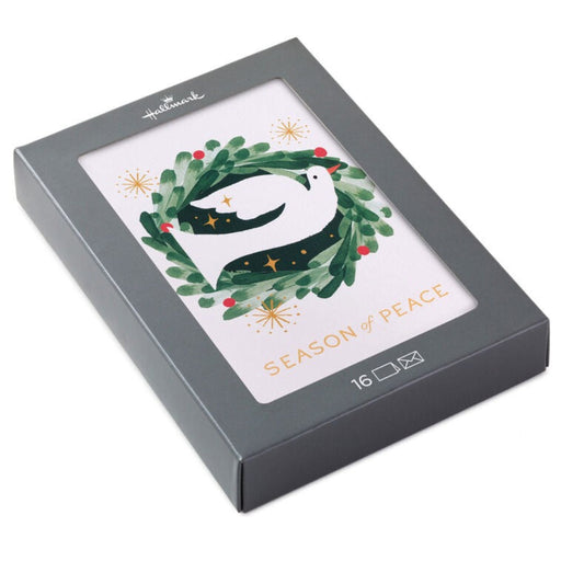 Holiday card with a dove and wreath design in a gray box packaging.