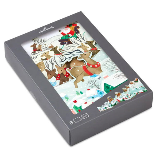 Christmas-themed product packaging with reindeer and Santa Claus design on a white background