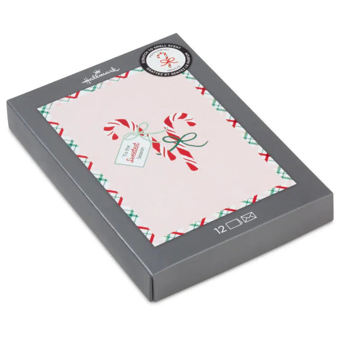 Gray box with a Christmas-themed card inside on a white background