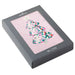 Hallmark Christmas card with a colorful tree design on a pink background, housed in a gray box.