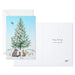 Holiday card with a snowy tree and animals, featuring a white envelope.