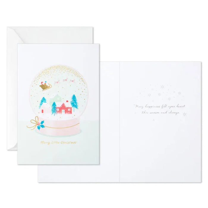Greeting card with a snow globe illustration and envelope on a white background
