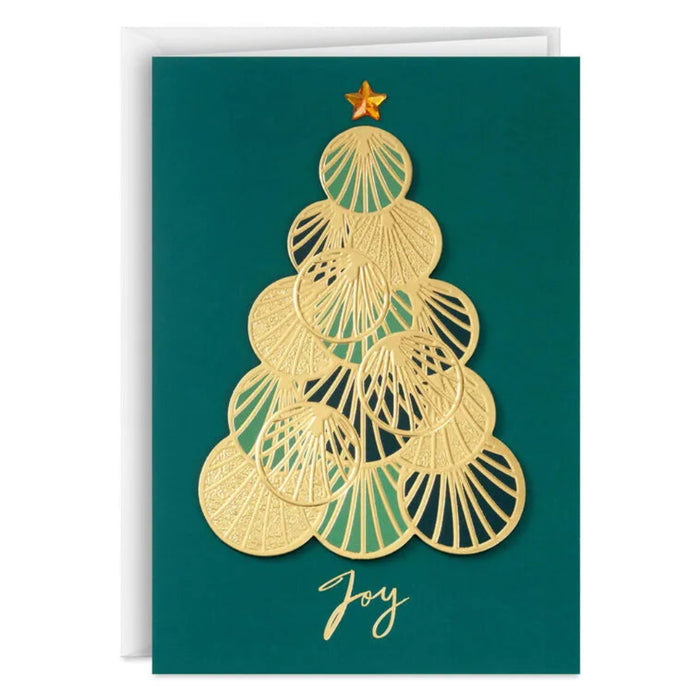 Greeting card with gold Christmas tree design on a green background