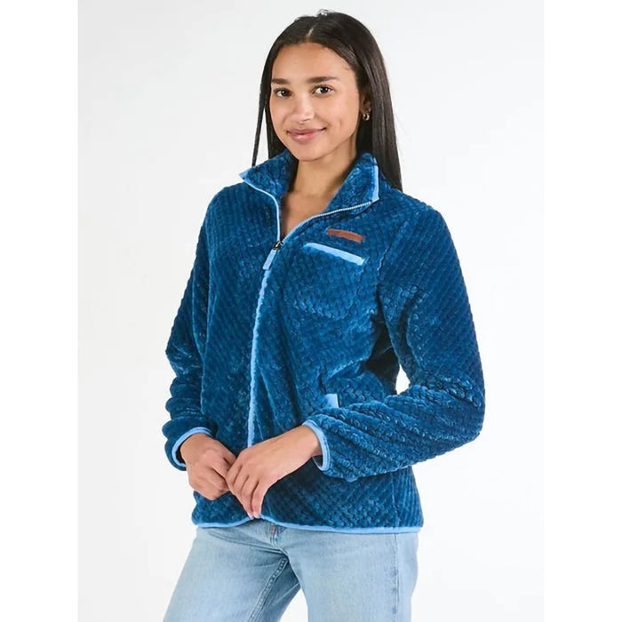 Woman wearing a blue fleece jacket on a white background